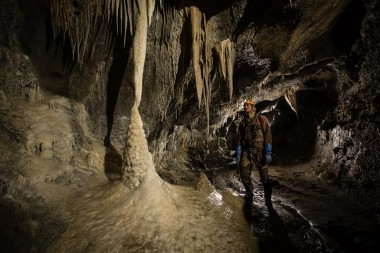 caving new zealand exploring icicles